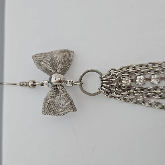 Feather, Rhinestone, Chain & Silvertone Metal Bow Pierced Earrings - Picture 3 of 9